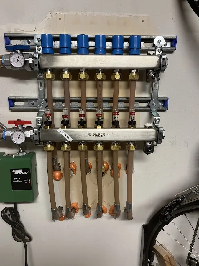 Plumber performing Water Heater Repair at a residential property in Longview